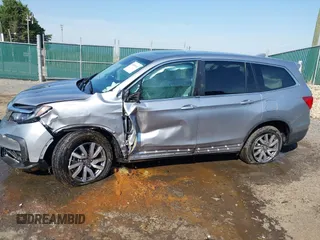 2020 Honda Pilot EX-L z VIN 5FNYF6H57LB059699, wystawiony jako IAAI lot #42026669 z przebiegiem 46 906 mil mil oraz . Historia ofert i sprzedaży dostępna na DreamBid. Obrazek 6.