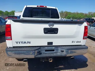 2014 Nissan Titan S with VIN 1N6AA0EC3EN502951, listed as a IAAI auction lot 41956309 with 128,464 mi miles and . Bid and sale history available at DreamBid. Image 16.