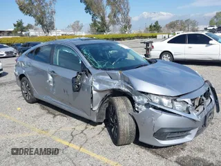 2016 Honda Civic Sedan EX with VIN 2HGFC2F74GH563268, listed as a IAAI auction lot 41805038 with 125,577 mi miles. Bid and sale history available at carsss.com. Image 1.