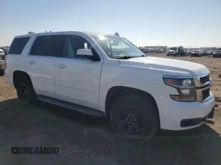 2015 Chevrolet Tahoe Commercial with VIN 1GNLC2EC2FR571987, listed as a Copart auction lot 45346895 with 106,708 mi miles and Salvage title. Bid and sale history available at DreamBid. Image 4.