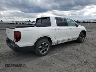 2019 Honda Ridgeline RTL-E with VIN 5FPYK3F74KB039057, listed as a Copart auction lot 57350525 with 105,102 mi miles and Salvage title. Bid and sale history available at DreamBid. Image 3.