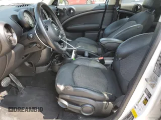 2014 MINI Countryman S with VIN WMWZC5C5XEWP37128, listed as a Copart auction lot 59549885 with 84,121 mi miles and Salvage title. Bid and sale history available at DreamBid. Image 7.