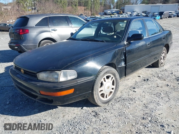 1994 Toyota Camry XLE with VIN JT2GK13E9R0025099, listed as a IAAI auction lot 41735273 with 281,833 mi miles. Bid and sale history available at carsss.com. Image 2.
