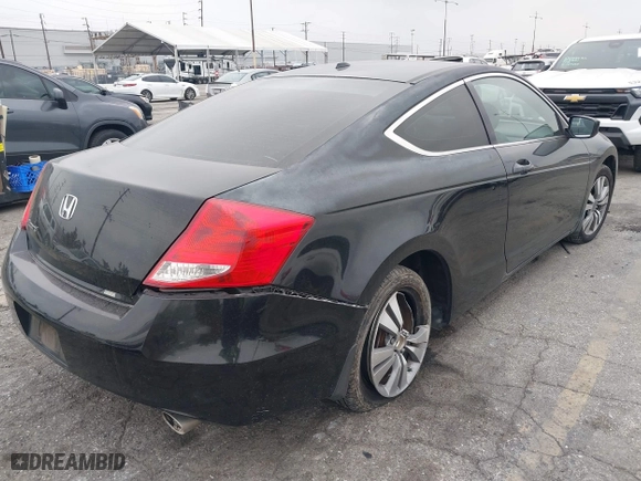 2011 Honda Accord Cpe EX-L with VIN 1HGCS1B86BA000499, listed as a IAAI auction lot 41877329 with 209,181 mi miles. Bid and sale history available at carsss.com. Image 4.