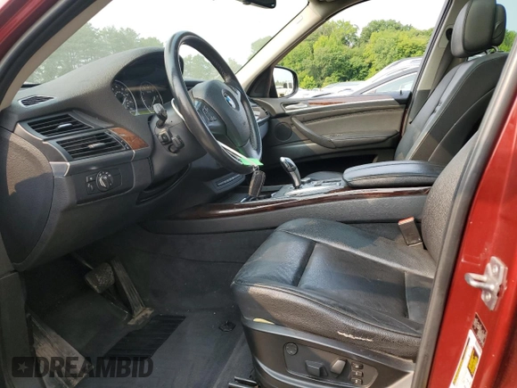 2012 BMW X5 35i z VIN 5UXZV4C56CL749152, wystawiony jako Copart lot #59525155 z przebiegiem 110 773 mil mil oraz Szkoda całkowita • Salvage title. Historia ofert i sprzedaży dostępna na DreamBid. Obrazek 7.