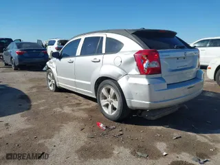 2010 Dodge Caliber SXT with VIN 1B3CB4HA4AD619143, listed as a IAAI auction lot 41694631 with 172,657 mi miles. Bid and sale history available at carsss.com. Image 3.