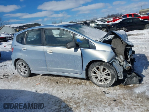 2009 Honda Fit Sport with VIN JHMGE884X9S026613, listed as a IAAI auction lot 41593112 with 144,736 mi miles. Bid and sale history available at carsss.com. Image 13.