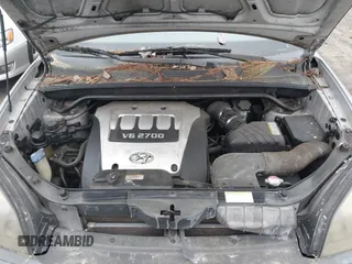 2005 Hyundai Tucson GLS with VIN KM8JN12D65U209038, listed as a IAAI auction lot 41929507 with 221,450 mi miles. Bid and sale history available at carsss.com. Image 10.