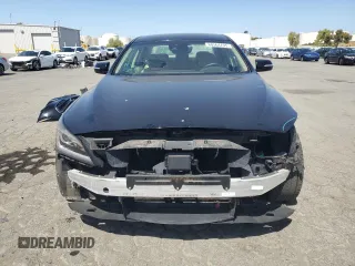 2018 Genesis G80 3.8L with VIN KMHGN4JE5JU227112, listed as a Copart auction lot 60564705 with 83,577 mi miles and Salvage title. Bid and sale history available at DreamBid. Image 5.