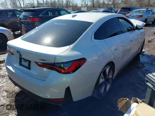2024 BMW i4 xDrive40 with VIN WBY83FB0XRFS41891, listed as a IAAI auction lot 41630295 with 7,287 mi miles. Bid and sale history available at carsss.com. Image 4.