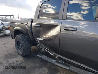 2017 Ram 1500 Rebel z VIN 1C6RR7YT2HS734120, wystawiony jako IAAI lot #41590424 z przebiegiem 113 034 mil mil oraz . Historia ofert i sprzedaży dostępna na DreamBid. Obrazek 6.