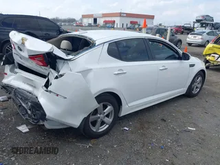 2014 Kia Optima LX with VIN 5XXGM4A71EG313635, listed as a IAAI auction lot 38894516 with 95,852 mi miles. Bid and sale history available at carsss.com. Image 4.