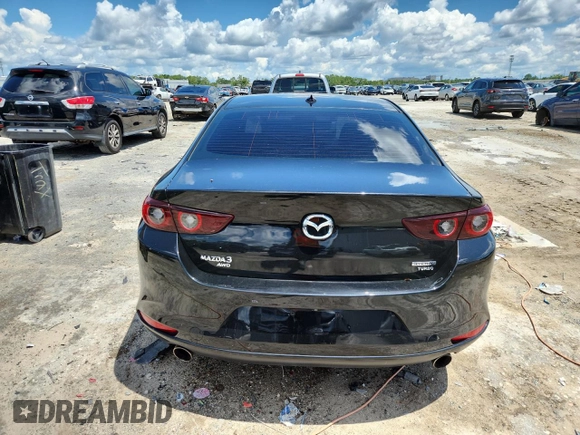 2022 Mazda 3 2.5 Turbo z VIN 3MZBPBAY9NM305244, wystawiony jako Copart lot #63661025 z przebiegiem 89 066 mil mil oraz Czysty tytuł • Clean title. Historia ofert i sprzedaży dostępna na DreamBid. Obrazek 6.