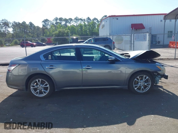 2014 Nissan Maxima S z VIN 1N4AA5AP2EC909623, wystawiony jako IAAI lot #42390407 z przebiegiem 182 610 mil mil oraz . Historia ofert i sprzedaży dostępna na DreamBid. Obrazek 13.
