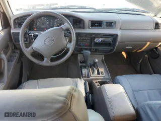 1996 Toyota Land Cruiser with VIN JT3HJ85J8T0140189, listed as a Copart auction lot 76720784 with 167,649 mi miles and Salvage Title. Bid and sale history available at carsss.com. Image 8.