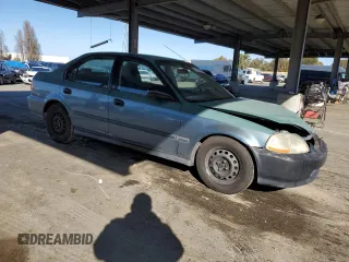 1998 Honda Civic DX with VIN JHMEJ6628WS010348, listed as a Copart auction lot 51292635 with 255,768 mi miles and Salvage Title. Bid and sale history available at carsss.com. Image 4.