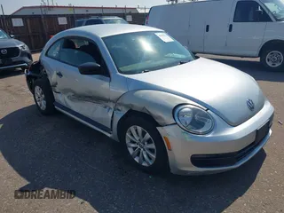 2013 Volkswagen Beetle Entry with VIN 3VWFP7AT1DM660636, listed as a IAAI auction lot 42838183 with 93,695 mi miles and . Bid and sale history available at DreamBid. Image 1.