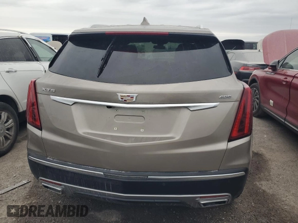 2022 Cadillac XT5 FWD Premium Luxury z VIN 1GYKNCRS1NZ126722, wystawiony jako Copart lot #87977755 z przebiegiem Nie podano mil oraz Nie do naprawy • Non repairable. Historia ofert i sprzedaży dostępna na DreamBid. Obrazek 6.