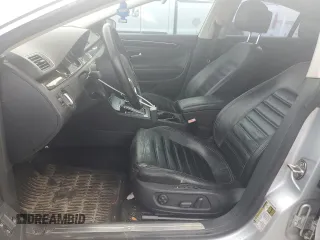 2013 Volkswagen CC Lux z VIN WVWHU7AN3DE500737, wystawiony jako Copart lot #56109175 z przebiegiem 135 579 mil mil oraz Tytuł czysty. Historia ofert i sprzedaży dostępna na DreamBid. Obrazek 7.