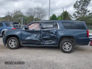 2019 Chevrolet Suburban LT with VIN 1GNSCHKC6KR135270, listed as a IAAI auction lot 41961931 with 103,428 mi miles and . Bid and sale history available at DreamBid. Image 14.