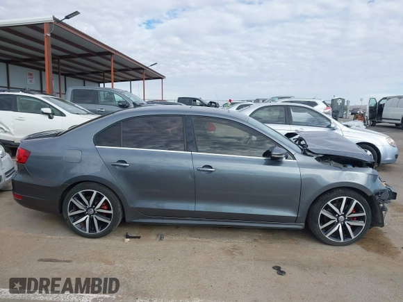 2013 Volkswagen Jetta GLI Autobahn with VIN 3VW467AJ7DM235818, listed as a IAAI auction lot 41061837 with 157,507 mi miles and . Bid and sale history available at DreamBid. Image 14.