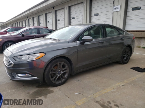2018 Ford Fusion SE z VIN 3FA6P0HD8JR245391, wystawiony jako Copart lot #53571445 z przebiegiem 158 138 mil mil oraz Czysty tytuł • Clean title. Historia ofert i sprzedaży dostępna na DreamBid. Obrazek 1.