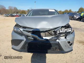 2023 Toyota Camry SE with VIN 4T1G11AK4PU099549, listed as a IAAI auction lot 41692241 with 63,835 mi miles. Bid and sale history available at carsss.com. Image 12.