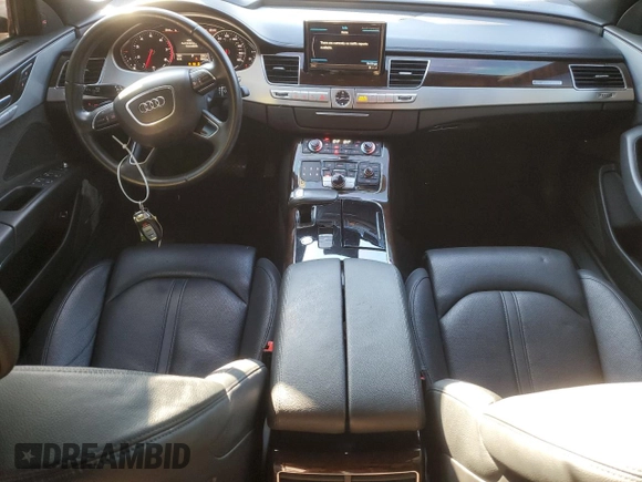 2015 Audi A8 with VIN WAUJGAFD3FN013026, listed as a Copart auction lot 67650374 with 88,064 mi miles and Salvage title. Bid and sale history available at DreamBid. Image 8.