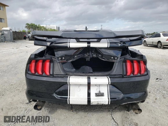 2021 Ford Mustang EcoBoost with VIN 1FA6P8TH4M5151881, listed as a Copart auction lot 49722985 with 56,041 mi miles and Non Repairable. Bid and sale history available at carsss.com. Image 6.