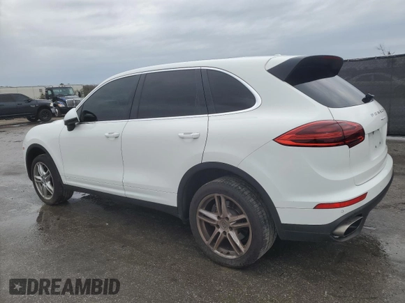 2016 Porsche Cayenne with VIN WP1AA2A28GKA10883, listed as a Copart auction lot 46428285 with 113,976 mi miles and Salvage Title. Bid and sale history available at carsss.com. Image 2.