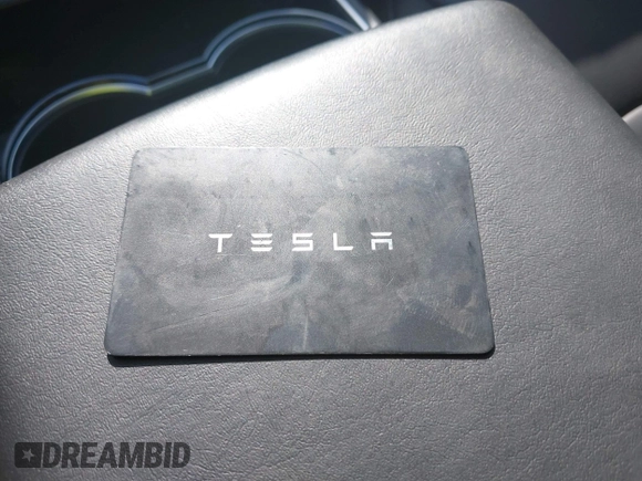 2018 Tesla Model 3 Long Range Battery with VIN 5YJ3E1EB7JF104356, listed as a IAAI auction lot 41936961 with 90,932 mi miles and . Bid and sale history available at DreamBid. Image 11.
