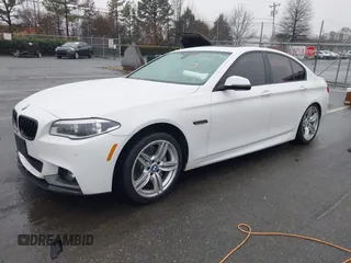 2014 BMW 5 Series 535d with VIN WBAXA5C58ED690612, listed as a IAAI auction lot 41570616 with 95,124 mi miles and . Bid and sale history available at carsss.com. Image 2.
