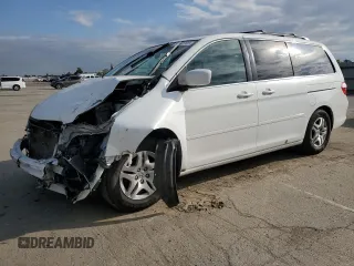 2007 Honda Odyssey EX-L with VIN 5FNRL38797B144949, listed as a Copart auction lot 51481105 with 148,016 mi miles and Salvage Title. Bid and sale history available at carsss.com. Image 1.