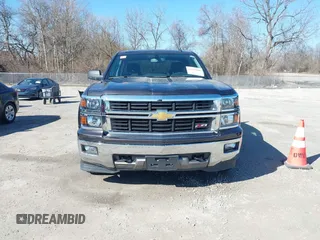 2014 Chevrolet Silverado 1500 LT with VIN 1GCVKREC0EZ377177, listed as a IAAI auction lot 41683600 with 148,672 mi miles and . Bid and sale history available at DreamBid. Image 12.