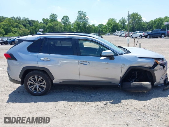 2022 Toyota RAV4 Hybrid XLE Premium with VIN JTMB6RFV1ND063963, listed as a IAAI auction lot 42550907 with 35,012 mi miles and . Bid and sale history available at DreamBid. Image 13.