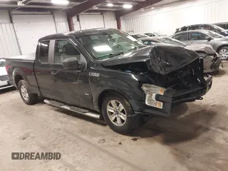 2015 Ford F-150 XLT with VIN 1FTEX1EP8FFC36723, listed as a IAAI auction lot 41738159 with 118,521 mi miles. Bid and sale history available at carsss.com. Image 1.