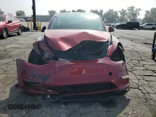 2024 Tesla Model Y с VIN 7SAYGDED3RF166676, выставлен на аукционе Copart как лот 60792165 с пробегом 22 445 миль миль и Списание • Salvage title. История ставок и продаж доступна на DreamBid. Изображение 5.