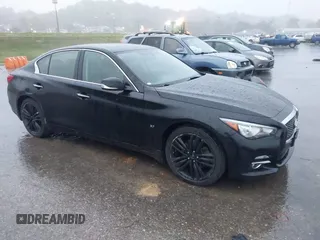 2015 Infiniti Q50 Premium z VIN JN1BV7ARXFM412382, wystawiony jako IAAI lot #40776813 z przebiegiem 66 406 mil mil oraz . Historia ofert i sprzedaży dostępna na DreamBid. Obrazek 1.