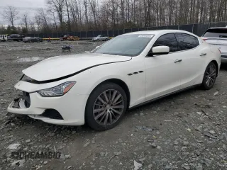 2016 Maserati Ghibli S Q4 with VIN ZAM57RTAXG1167704, listed as a Copart auction lot 48040095 with 48,885 mi miles and Salvage Title. Bid and sale history available at carsss.com. Image 1.