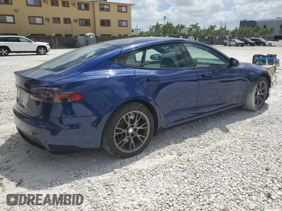 2021 Tesla Model S Long Range с VIN 5YJSA1E50MF452893, выставлен на аукционе Copart как лот 54139865 с пробегом 56 410 миль миль и Списание • Salvage title. История ставок и продаж доступна на DreamBid. Изображение 3.