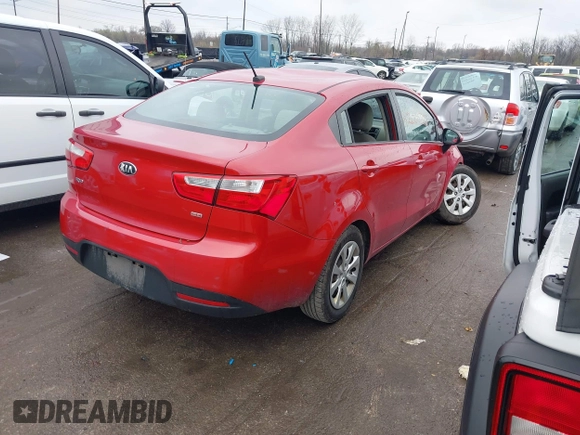 2014 Kia Rio LX with VIN KNADM4A36E6417050, listed as a IAAI auction lot 42005888 with 129,433 mi miles. Bid and sale history available at carsss.com. Image 4.