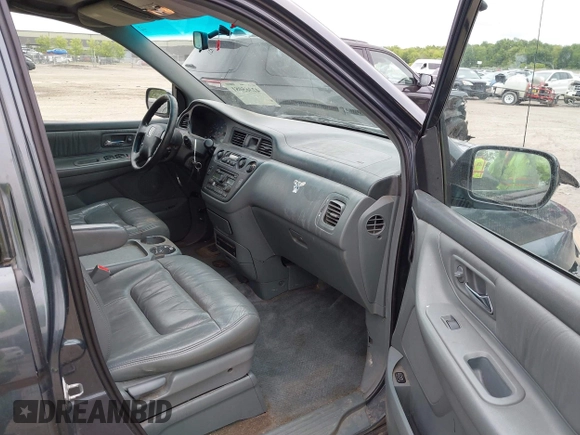 2003 Honda Odyssey EX-L z VIN 5FNRL18053B133092, wystawiony jako IAAI lot #42365081 z przebiegiem 239 753 mil mil oraz . Historia ofert i sprzedaży dostępna na DreamBid. Obrazek 5.