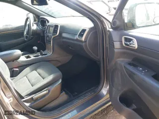 2015 Jeep Grand Cherokee Laredo with VIN 1C4RJFAG2FC133806, listed as a IAAI auction lot 41732455 with 67,955 mi miles. Bid and sale history available at carsss.com. Image 5.