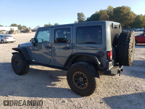 2013 Jeep Wrangler Unlimited Rubicon 10th Anniversary z VIN 1C4HJWFG0DL704100, wystawiony jako Copart lot #75573634 z przebiegiem 103 158 mil mil oraz Szkoda całkowita • Salvage title. Historia ofert i sprzedaży dostępna na DreamBid. Obrazek 2.