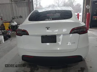 2023 Tesla Model Y Long Range z VIN 7SAYGAEEXPF789037, wystawiony jako IAAI lot #41551605 z przebiegiem 8 630 mil mil oraz . Historia ofert i sprzedaży dostępna na DreamBid. Obrazek 16.