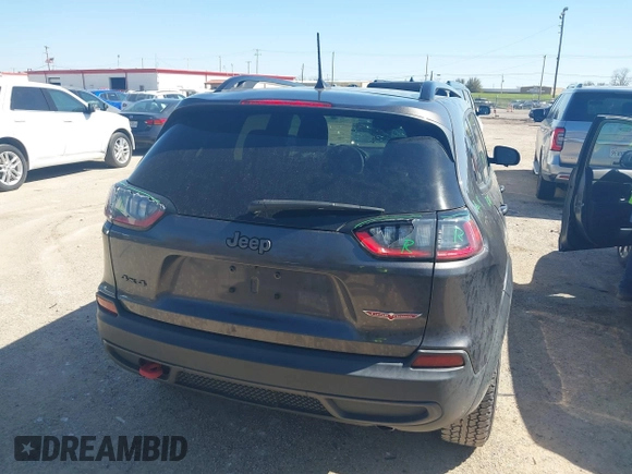 2022 Jeep Cherokee Trailhawk with VIN 1C4PJMBX4ND535037, listed as a IAAI auction lot 41779140 with 49,733 mi miles. Bid and sale history available at carsss.com. Image 16.