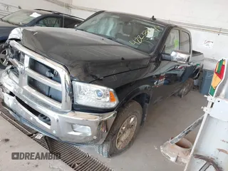 2017 Ram 2500 Laramie with VIN 3C6UR5FL8HG671078, listed as a IAAI auction lot 42233014 with 295,572 mi miles and . Bid and sale history available at DreamBid. Image 2.