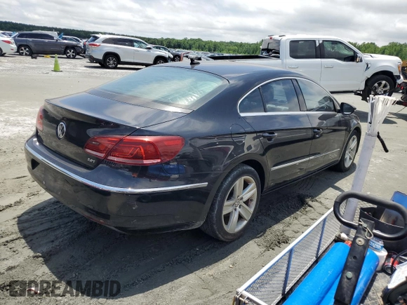 2013 Volkswagen CC Sport z VIN WVWBP7AN4DE551824, wystawiony jako Copart lot #58499425 z przebiegiem 121 809 mil mil oraz Tytuł czysty. Historia ofert i sprzedaży dostępna na DreamBid. Obrazek 3.