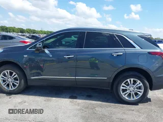 2020 Cadillac XT5 Luxury FWD z VIN 1GYKNAR45LZ224459, wystawiony jako IAAI lot #42295055 z przebiegiem 69 751 mil mil oraz . Historia ofert i sprzedaży dostępna na DreamBid. Obrazek 14.