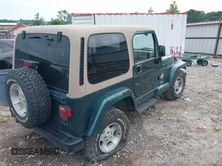 1999 Jeep Wrangler Sahara with VIN 1J4FY49S5XP482037, listed as a IAAI auction lot 42341723 with 161,081 mi miles and . Bid and sale history available at DreamBid. Image 4.